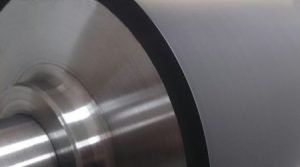 Coating and manufacturing rubber rollers